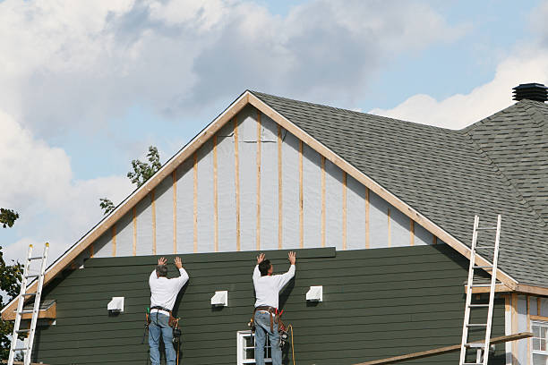 Professional Siding Installation technician working in Long Branch, VA